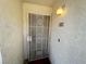 Inviting front door with a security screen and a well-lit entrance at 698 S Racetrack Rd # 322, Henderson, NV 89015