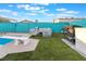 Backyard features a diving board, patio seating, fire pit, and privacy fence at 7018 Berkshire Pl, Las Vegas, NV 89147