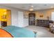 Spacious main bedroom with furniture and access to the bathroom at 7175 Steubling Glen St, North Las Vegas, NV 89084