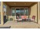 Outdoor patio space features a comfortable seating arrangement, perfect for relaxing and enjoying the outdoors at 7175 Steubling Glen St, North Las Vegas, NV 89084