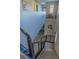 Unique staircase, with modern railing and wood stairs, leads to the upper level at 7175 Steubling Glen St, North Las Vegas, NV 89084