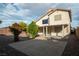 This house has a covered patio and decorative rock landscaping at 787 Craigmark Ct, Henderson, NV 89002