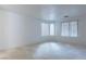 Bright bedroom with large windows and neutral carpet, ready for personalization at 787 Craigmark Ct, Henderson, NV 89002