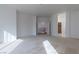 Spacious bedroom with neutral carpeting and multiple entryways at 787 Craigmark Ct, Henderson, NV 89002