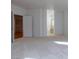 Spacious bedroom with neutral carpeting and attached bathroom at 787 Craigmark Ct, Henderson, NV 89002