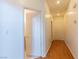 Hallway features laminate flooring leading to multiple rooms with neutral wall paint at 787 Craigmark Ct, Henderson, NV 89002
