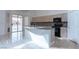 Functional kitchen featuring a center island, granite countertops, and stainless steel appliances at 787 Craigmark Ct, Henderson, NV 89002