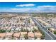 A panoramic view of a suburban neighborhood with lush landscaping and well-maintained streets at 8504 W Gilmore Ave, Las Vegas, NV 89129