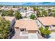 Aerial view of a single Gathering home with well-manicured landscaping at 8504 W Gilmore Ave, Las Vegas, NV 89129