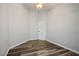 Bedroom featuring neutral walls, hardwood floors, and ample space, ready for your personal touch at 8504 W Gilmore Ave, Las Vegas, NV 89129