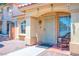 Inviting front entrance with a security door and charming decor at 8504 W Gilmore Ave, Las Vegas, NV 89129