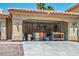 Two-car garage offering ample storage space and potential for a workshop at 8504 W Gilmore Ave, Las Vegas, NV 89129