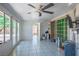 Large patio area featuring a ceiling fan and plenty of natural light at 8504 W Gilmore Ave, Las Vegas, NV 89129