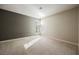 Bright bedroom with natural light, neutral carpet, and calming wall colors at 9000 Opus Dr, Las Vegas, NV 89117