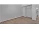 Bedroom featuring carpeted floors and a closet, providing a functional space at 9290 S Cool Creek Ave, Las Vegas, NV 89147