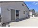Spacious patio area with a sliding glass door, offering ample outdoor space at 9290 S Cool Creek Ave, Las Vegas, NV 89147