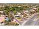 An aerial view of a residential neighborhood with tree lined streets and well manicured landscaping at 9501 Balatta Canyon Ct, Las Vegas, NV 89144