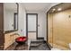 Bathroom showcasing a unique vessel sink, elegant tile work, and a modern glass shower at 9501 Balatta Canyon Ct, Las Vegas, NV 89144