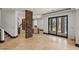 Open living area with stone accent pillars and access to the backyard at 9501 Balatta Canyon Ct, Las Vegas, NV 89144