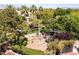Community playground with mature shade trees and lush landscaping at 9501 Balatta Canyon Ct, Las Vegas, NV 89144