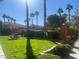 Landscaped community green space with picnic tables and shade trees at 1050 E Cactus Ave # 2110, Las Vegas, NV 89183