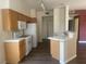 Functional kitchen with white appliances, bright cabinets, and open to the living area at 1050 E Cactus Ave # 2110, Las Vegas, NV 89183