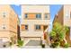 Modern two-story home with a two-car garage and desert landscaping at 10525 Shiny Skies Dr, Las Vegas, NV 89129