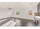 Open floor plan living area with tiled floors, recessed lighting, and abundant natural light, creating a welcoming ambiance at 10525 Shiny Skies Dr, Las Vegas, NV 89129