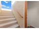 Outdoor staircase with stucco wall and adjacent to interior entrance at 10525 Shiny Skies Dr, Las Vegas, NV 89129