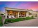 Charming backyard with covered patio, lounge chairs, and well-maintained landscaping perfect for outdoor living at 10713 Shoalhaven Dr, Las Vegas, NV 89134