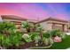 Beautiful single-story home featuring lush desert landscaping and a warm, inviting exterior at 10713 Shoalhaven Dr, Las Vegas, NV 89134