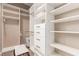 Well-organized walk-in closet featuring shelving, drawers, and ample storage space at 10713 Shoalhaven Dr, Las Vegas, NV 89134