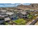 Backyard with synthetic lawn, patio, and desert-style landscaping at 10954 Free Flow Pl, Las Vegas, NV 89138