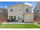 Well-maintained backyard with green grass, patio, and convenient outdoor living space at 10954 Free Flow Pl, Las Vegas, NV 89138