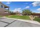 Spacious backyard featuring a well-maintained lawn, patio, and mountain views at 10954 Free Flow Pl, Las Vegas, NV 89138