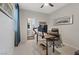 Well-lit home office with modern desk setup and a bathroom right off of it at 10954 Free Flow Pl, Las Vegas, NV 89138