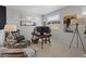 Office features a desk, chair, and a comfortable sitting area with natural light at 10954 Free Flow Pl, Las Vegas, NV 89138