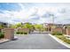 Gated community entrance showcasing manicured landscaping and inviting surroundings at 12018 Vento Forte Ave, Las Vegas, NV 89138