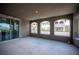 Spacious covered patio with view of neighboring houses at 12018 Vento Forte Ave, Las Vegas, NV 89138