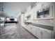 Modern kitchen featuring stainless steel appliances and sleek countertops at 12018 Vento Forte Ave, Las Vegas, NV 89138