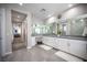 Contemporary main bathroom featuring double vanity, tile floors, and recessed lighting at 12018 Vento Forte Ave, Las Vegas, NV 89138