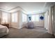 Spacious main bedroom with recessed lighting, big windows and modern decor at 12018 Vento Forte Ave, Las Vegas, NV 89138