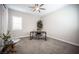Bright office space with neutral walls and a ceiling fan at 12018 Vento Forte Ave, Las Vegas, NV 89138