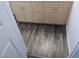 Bathroom featuring stylish wood-look flooring and cream-colored vanity at 1401 N Michael Way # 244, Las Vegas, NV 89108