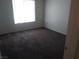 Bedroom with plush carpet and natural light at 1401 N Michael Way # 244, Las Vegas, NV 89108