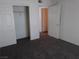 Bedroom with closet and access to additional rooms at 1401 N Michael Way # 244, Las Vegas, NV 89108