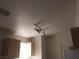 Kitchen featuring a track lighting and white cabinets at 1401 N Michael Way # 244, Las Vegas, NV 89108