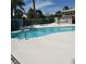 Community pool with a shaded seating area and desert landscaping at 1401 N Michael Way # 244, Las Vegas, NV 89108