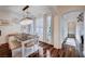 Charming dining room featuring a wood table, modern lighting, and a view to the hallway at 167 Thunder Plains Way, Henderson, NV 89012