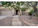 Charming single-story home with a well-manicured front yard and a two-car garage at 167 Thunder Plains Way, Henderson, NV 89012